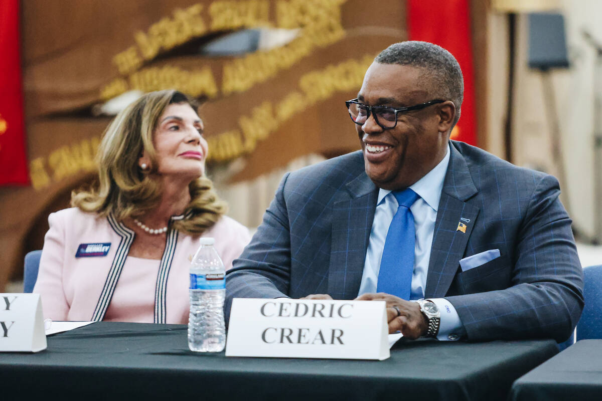 Mayoral candidate and Las Vegas City Councilman Cedric Crear laughs during a forum for the cand ...