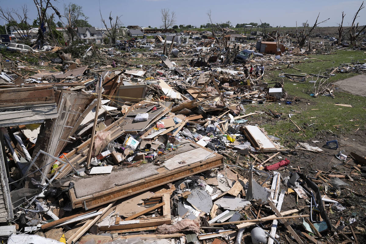 Debris from tornado damaged homes is seen, Wednesday, May 22, 2024, in Greenfield, Iowa. (AP Ph ...