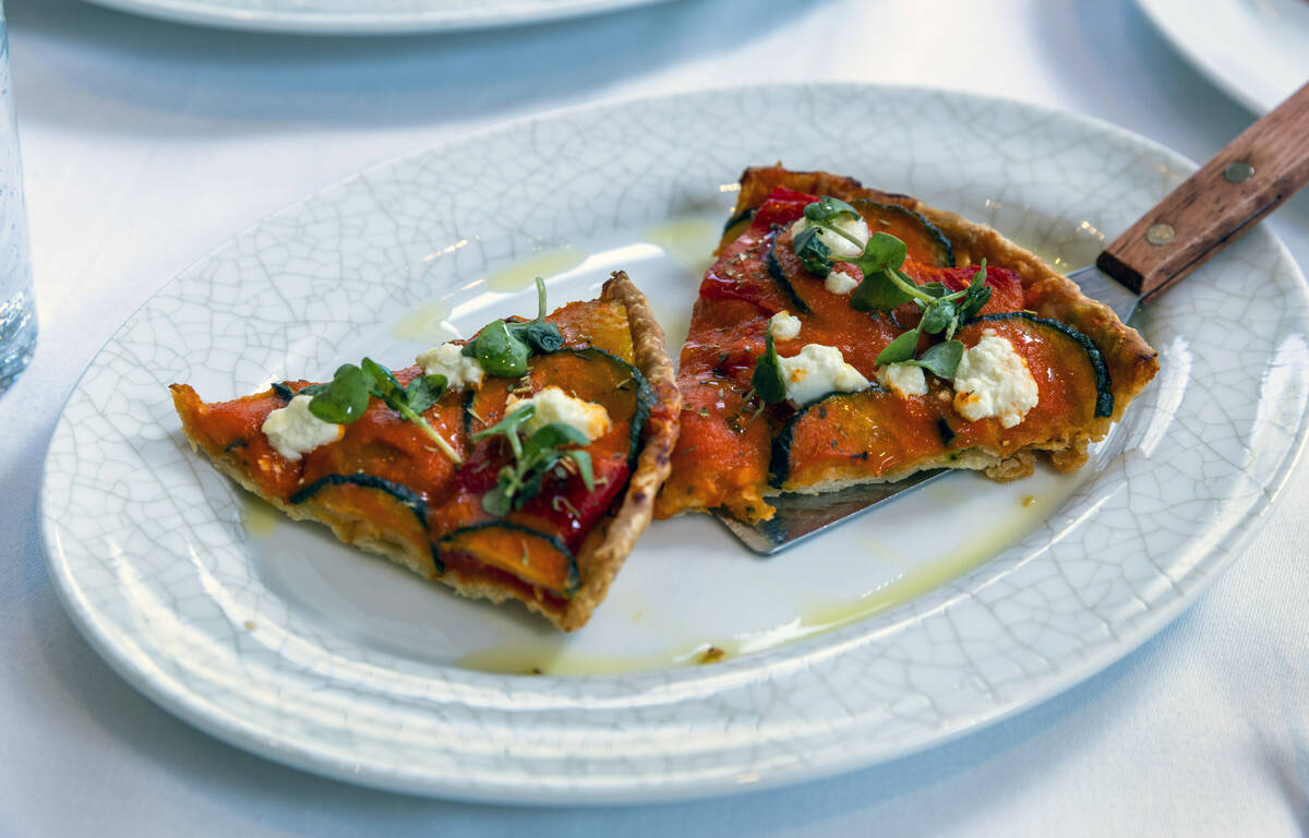 Provencal Ratatouille Tart with tomato sauce, feta cheese and basil during brunch at LPM within ...