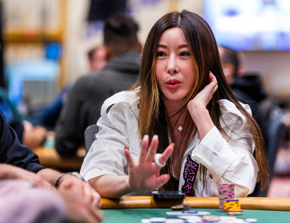 Kitty Kuo talks to another player during the WSOP opening event Champions Reunion No-Limit Hold ...