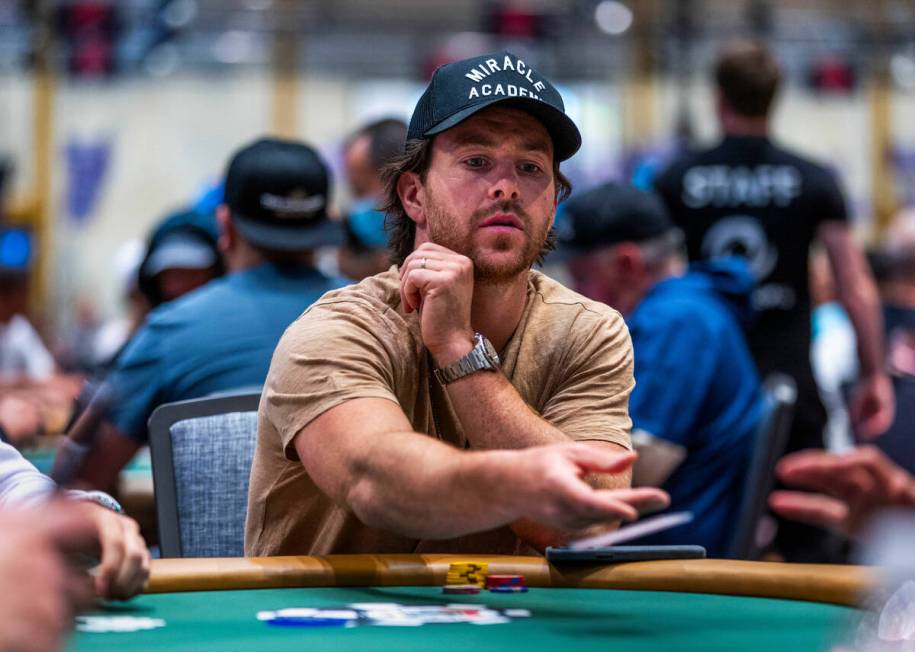 The Golden Knights Jonathan Marchessault tosses his hand back during the WSOP opening event Cha ...