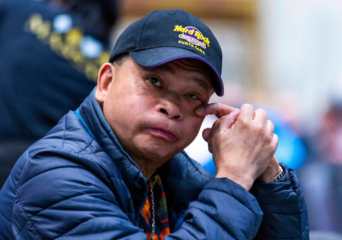Johnny Chan considers his hand during the WSOP opening event Champions Reunion No-Limit Hold&#x ...