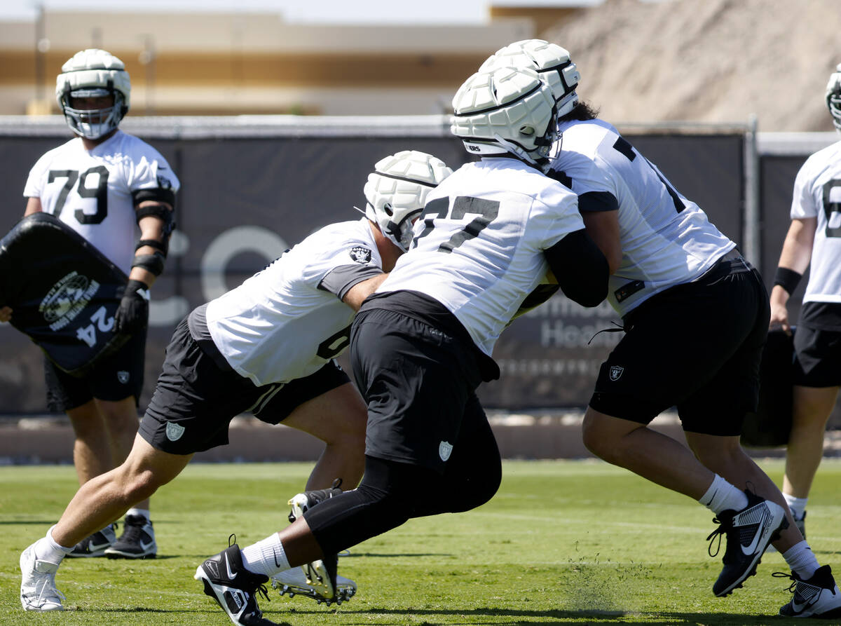 Raiders offensive tackle Thayer Munford Jr. (77) runs a blocking drill during organized team ac ...