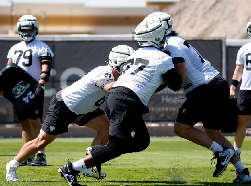 Raiders offensive tackle Thayer Munford Jr. (77) runs a blocking drill during organized team ac ...