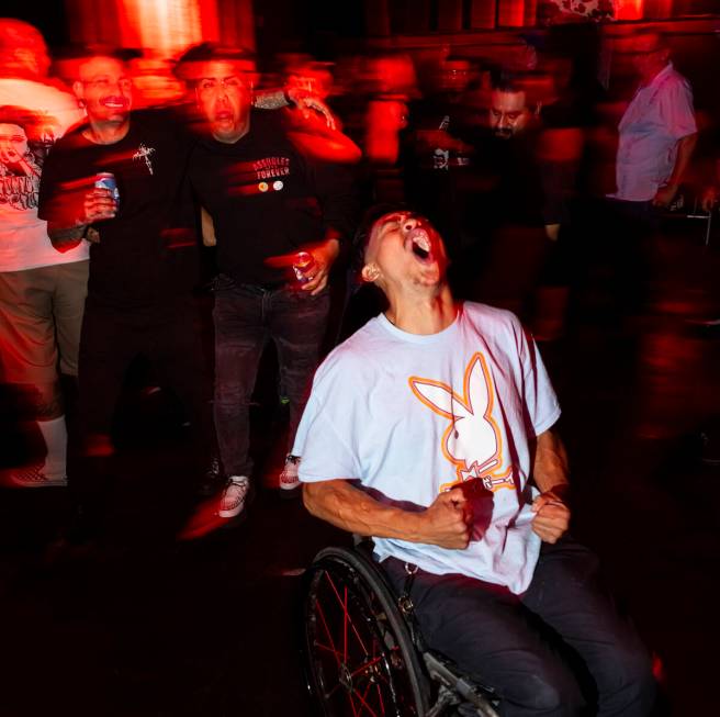 Festival attendees mosh as The Meteors perform during a Punk Rock Bowling music festival club s ...