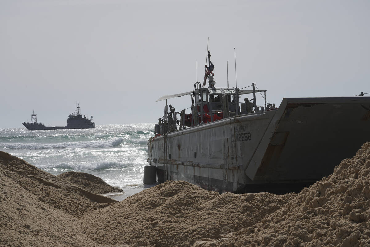 A U.S. Army landing craft is seen beached in Ashdod on Sunday, May 26, 2024, after being swept ...