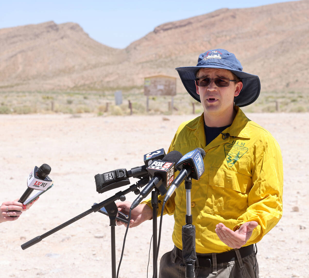 Shane Kelly, BLM Southern Nevada District fire prevention specialist, talks to the news media i ...
