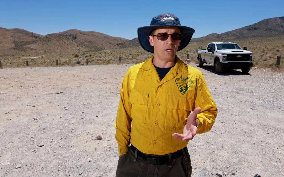 Shane Kelly, BLM Southern Nevada District fire prevention specialist, talks to the news media i ...