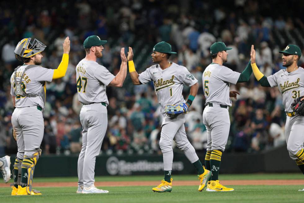 Oakland Athletics' Shea Langeliers, Michael Kelly, Esteury Ruiz, J.D. Davis and Abraham Toro, f ...