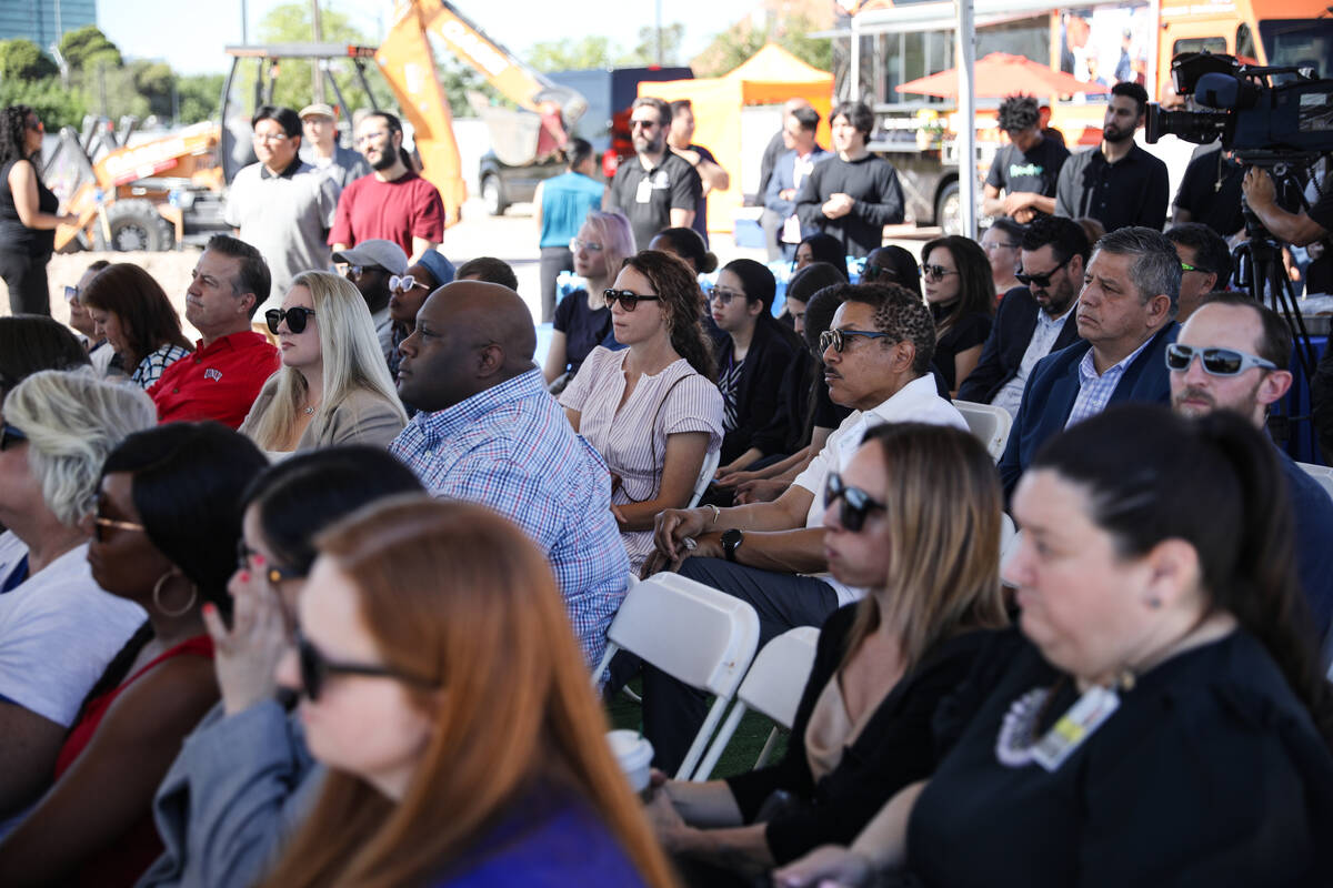 The audience listens to a speaker at a groundbreaking event for the Historic Westside Education ...