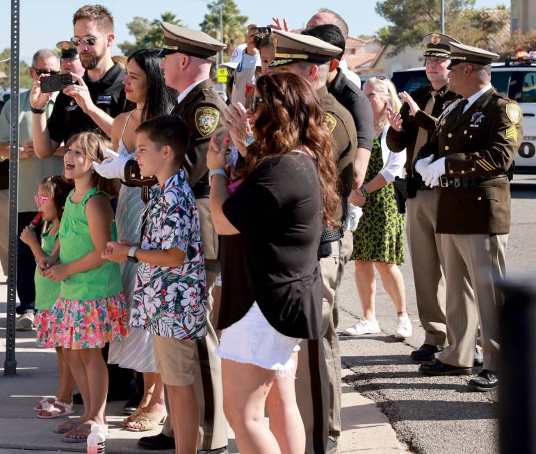 Family of fallen Las Vegas police Sgt. Henry Prendes react to the unveiling the new Henry Prend ...