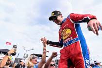 Driver Noah Gragson high-fives fans prior to a NASCAR Cup Series auto race at Charlotte Motor S ...