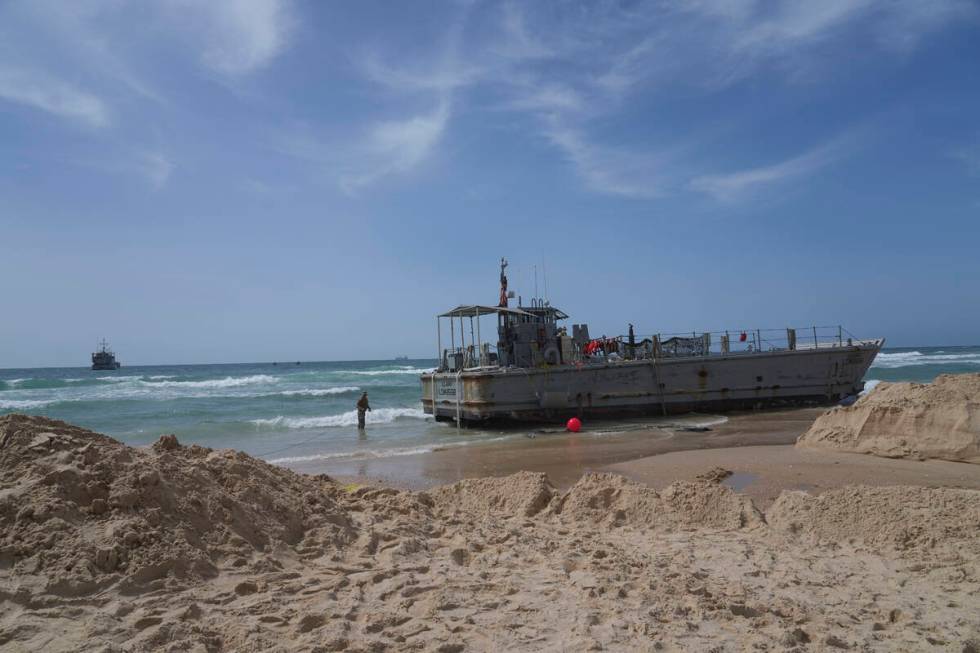 A U.S. Army landing craft is seen beached in Ashdod on Sunday, May 26, 2024, after being swept ...