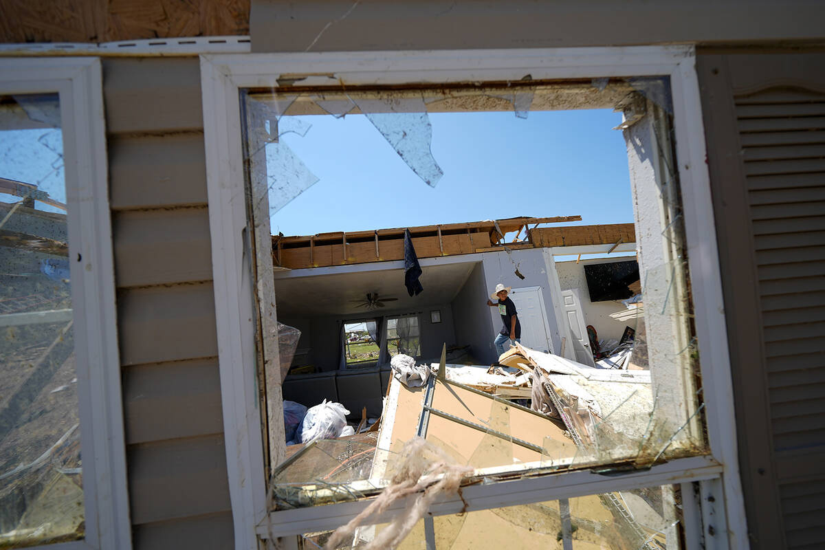 Larry Landeros, 9, who rode out a deadly tornado with his parents when it rolled through the pr ...