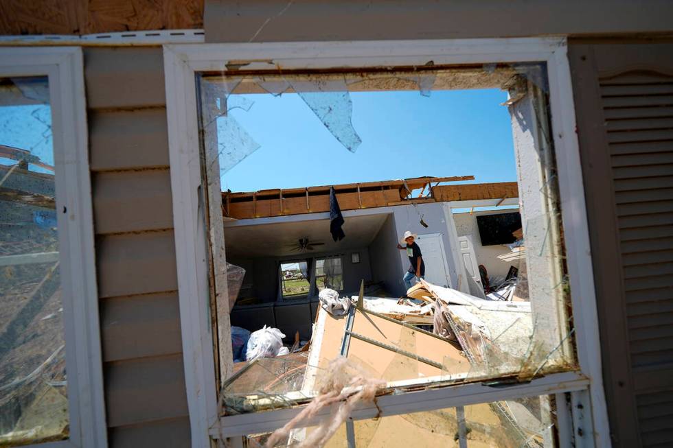 Larry Landeros, 9, who rode out a deadly tornado with his parents when it rolled through the pr ...