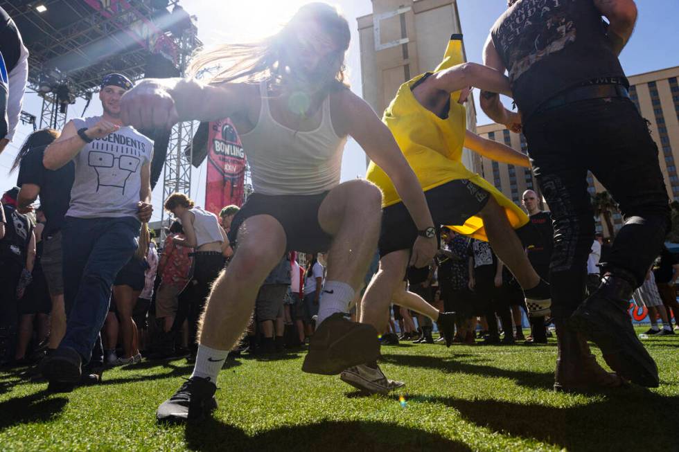 Festival attendees mosh during the Punk Rock Bowling music festival at Downtown Las Vegas Event ...