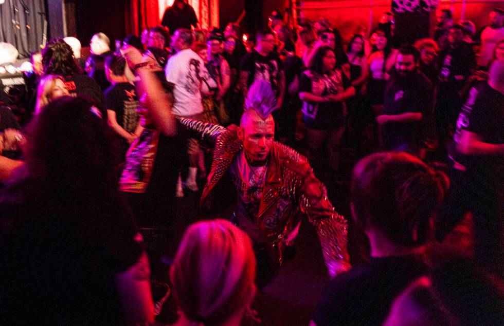 Festival attendees mosh as The Meteors perform during a Punk Rock Bowling music festival club s ...