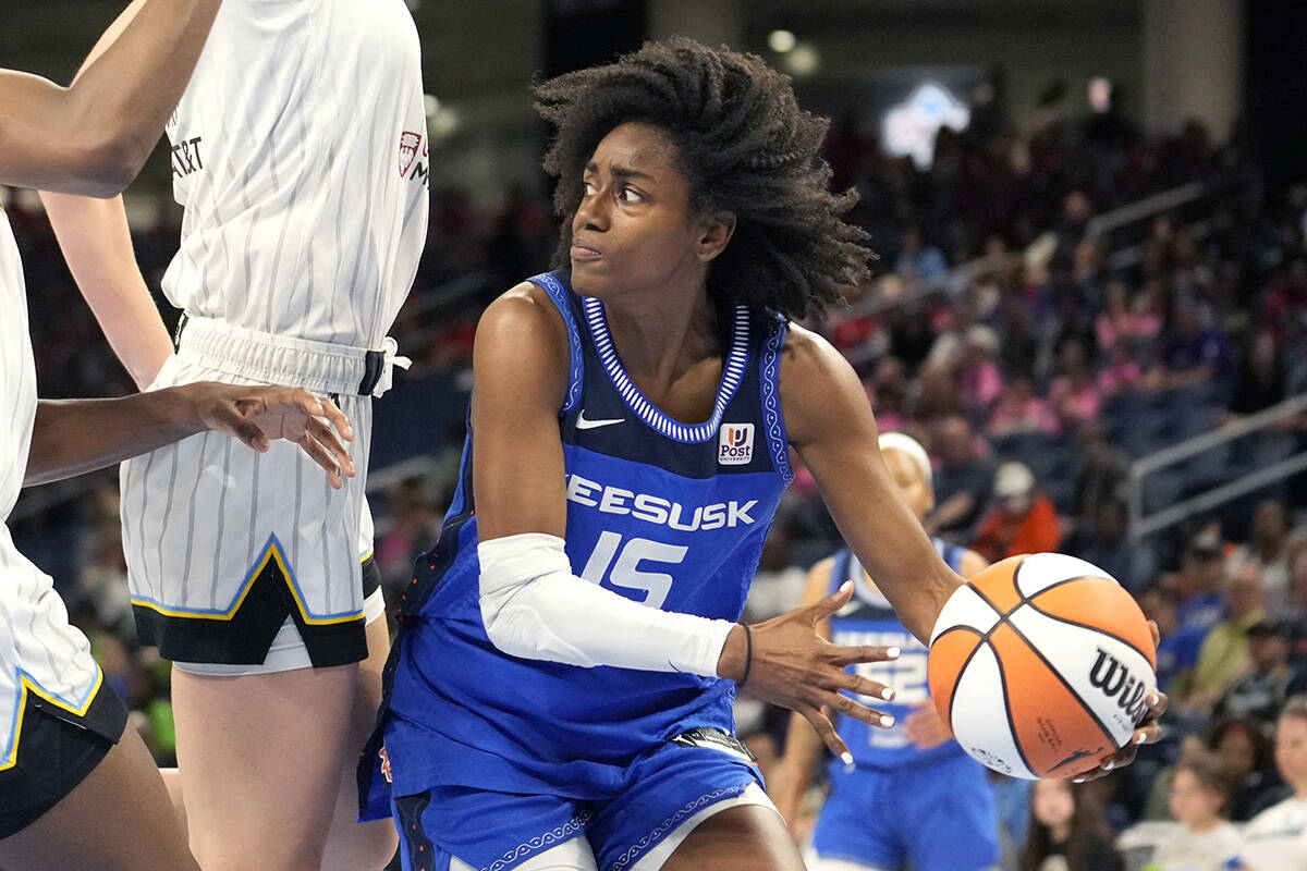 Connecticut Sun's Tiffany Hayes looks to pass during a WNBA basketball game against the Chicago ...