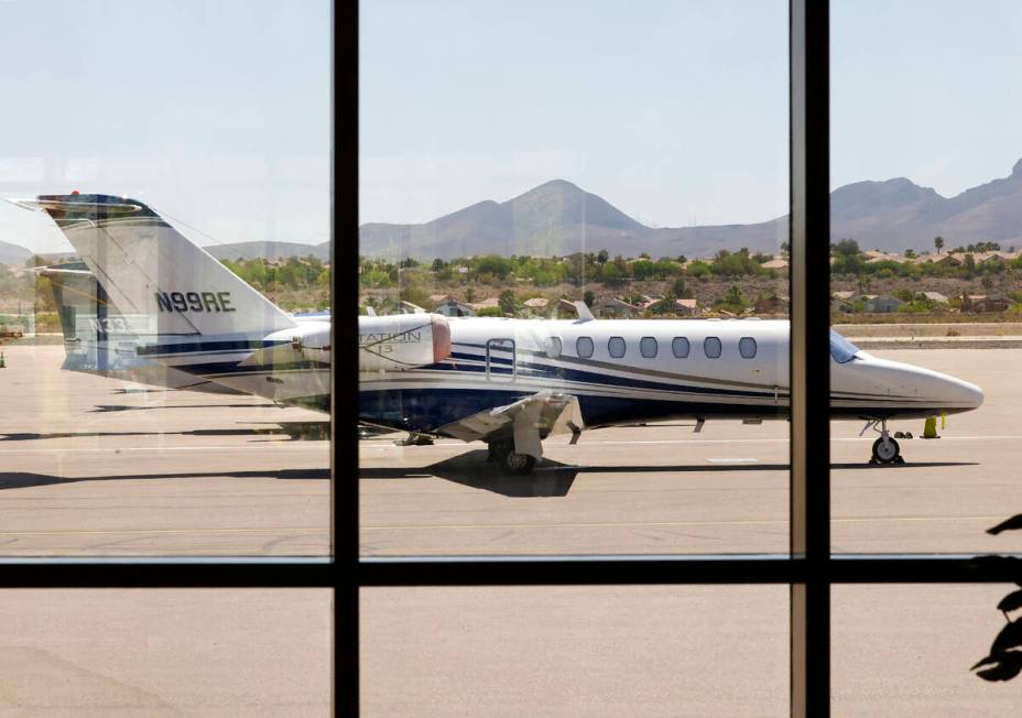Private planes line the tarmac at Henderson Executive Airport, on Friday, May 31, 2024. (Bizuay ...