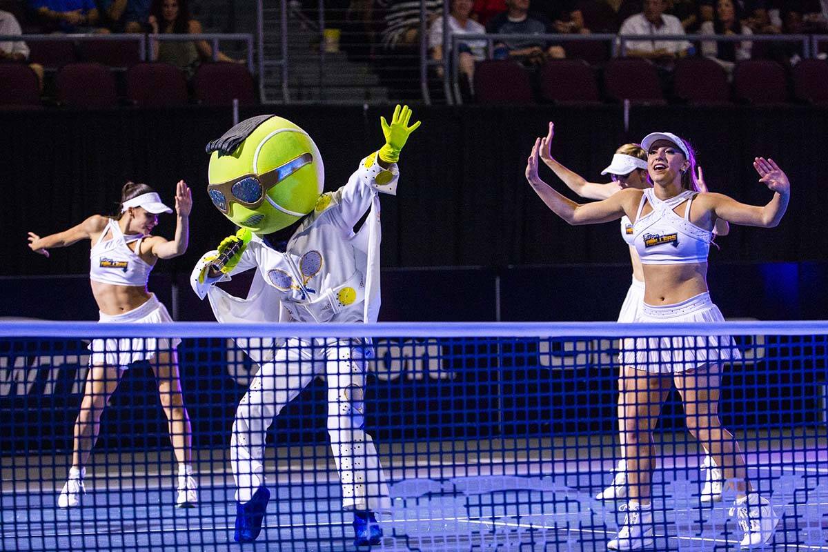The Rollers' mascot King performs with the Rollers Dancers in their World Team Tennis match at ...