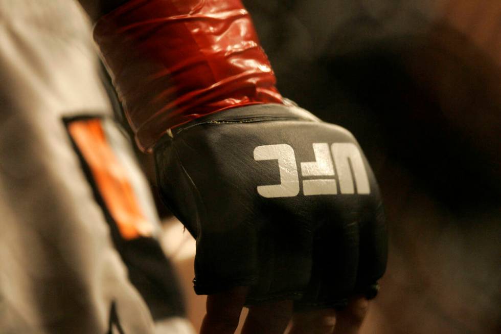 Closeup of a glove and the UFC logo at Ultimate Fighting Championship 73 on Saturday, July 7, 2 ...