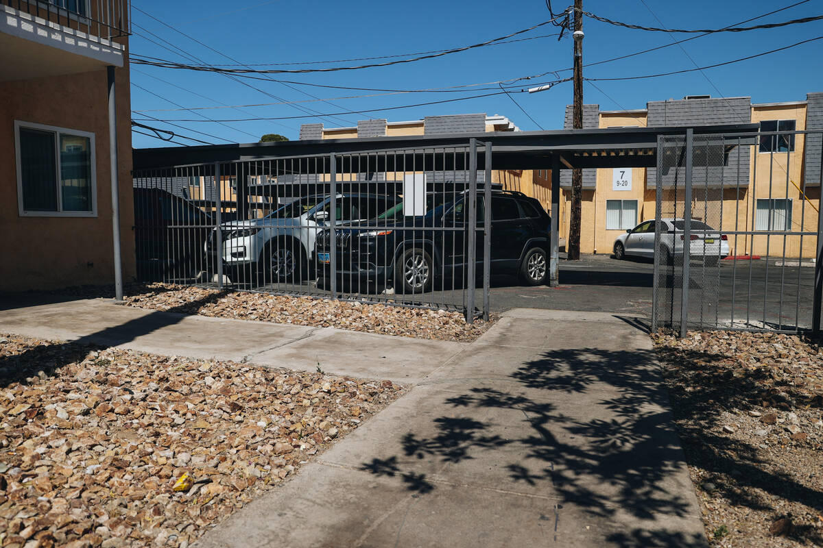 The spot where John Dubeck and his wife, Francis Ann, were shot dead in their apartment complex ...