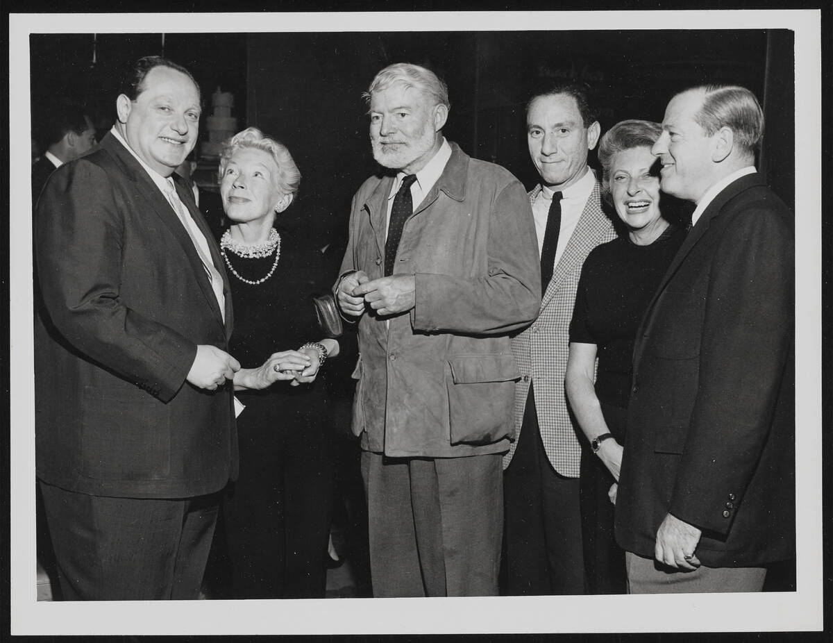 Ernest Hemingway, center, is seen during a 1959 visit to Las Vegas. (Las Vegas News Bureau)
