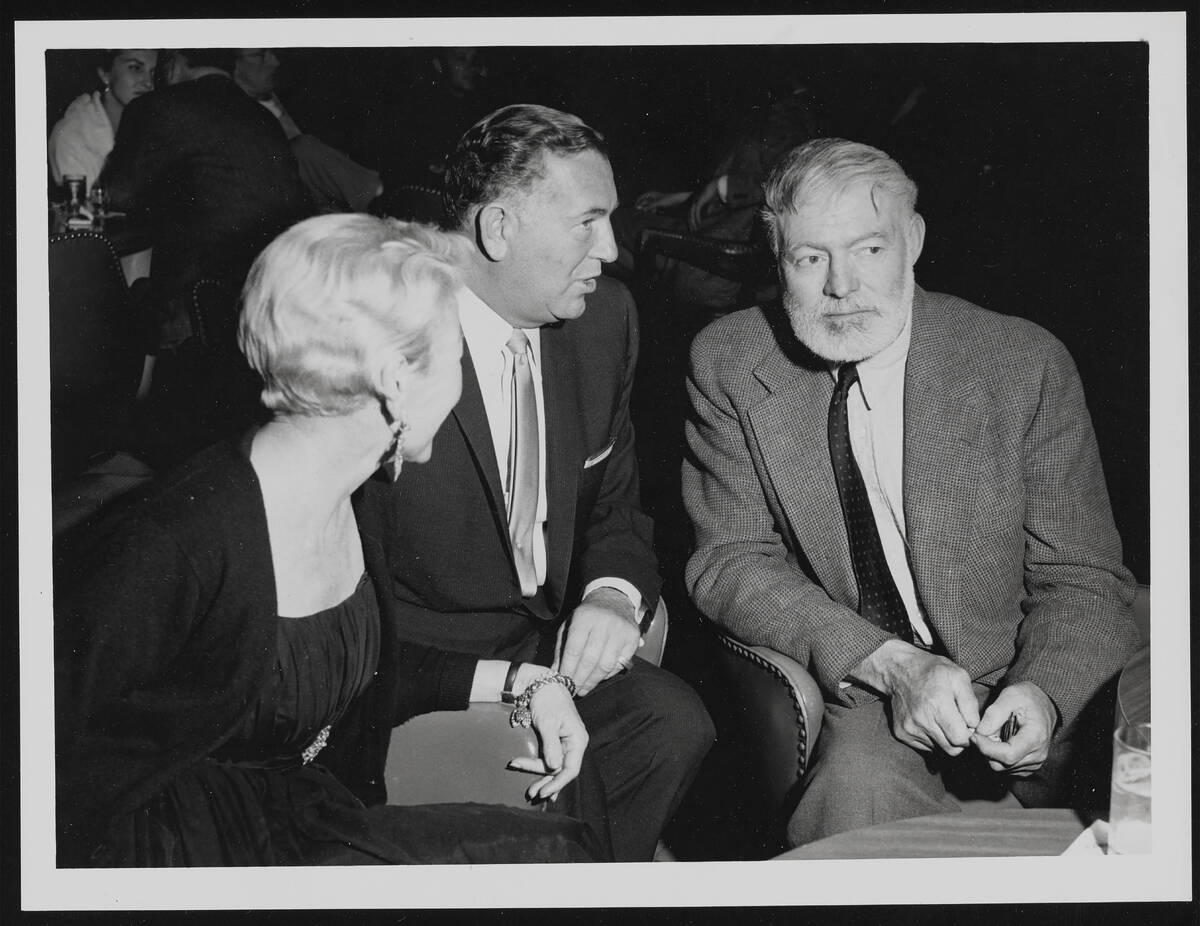 Ernest Hemingway, right, is seen during a 1959 visit to Las Vegas. (Las Vegas News Bureau)