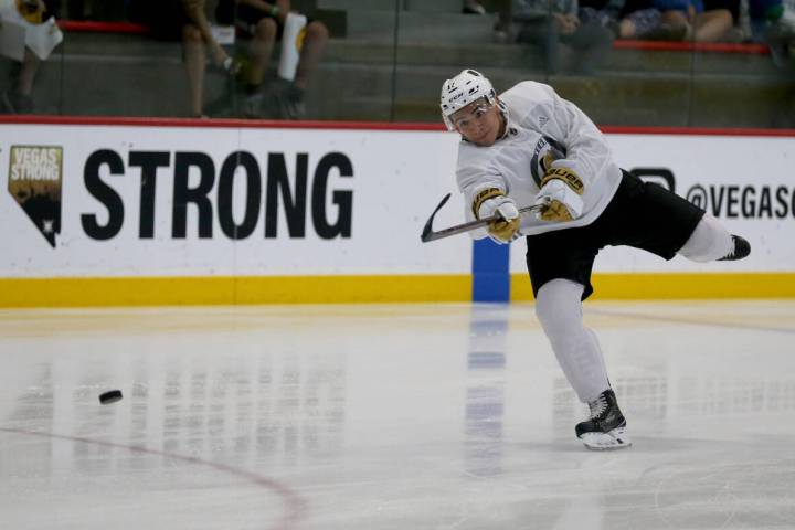 Vegas Golden Knights forward Nick Suzuki shoots during the first day of development camp at Cit ...