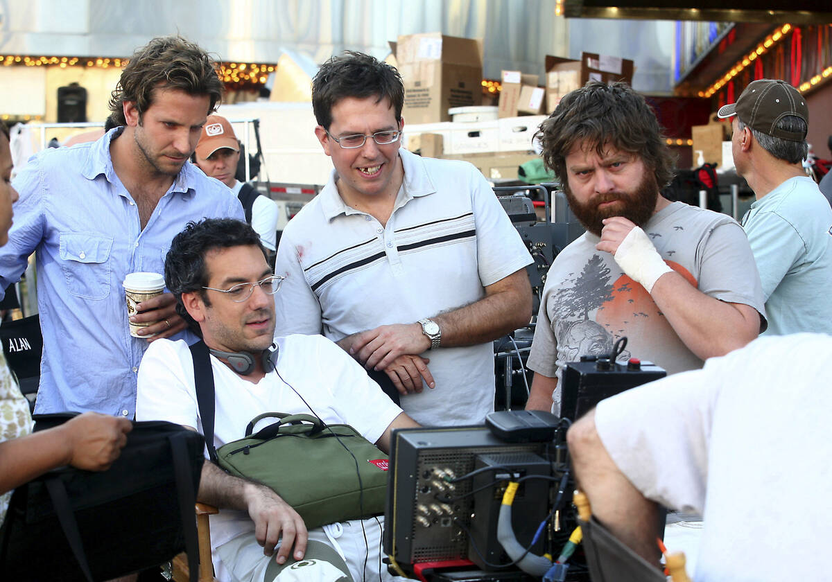 Director Todd Phillips(front) and stars Bradley Cooper, Ed Helms, & Zach Galifianakis (L-R) rev ...
