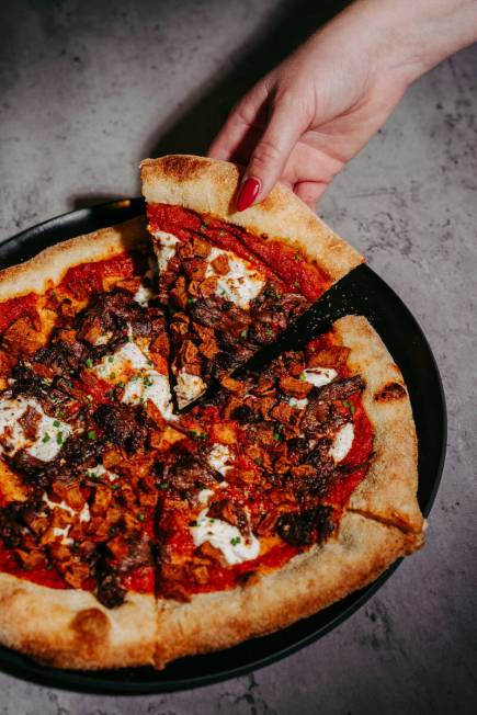 Beef cheeks pizza from Bramàre, an Italian restaurant set to debut in late June on Paradise Ro ...