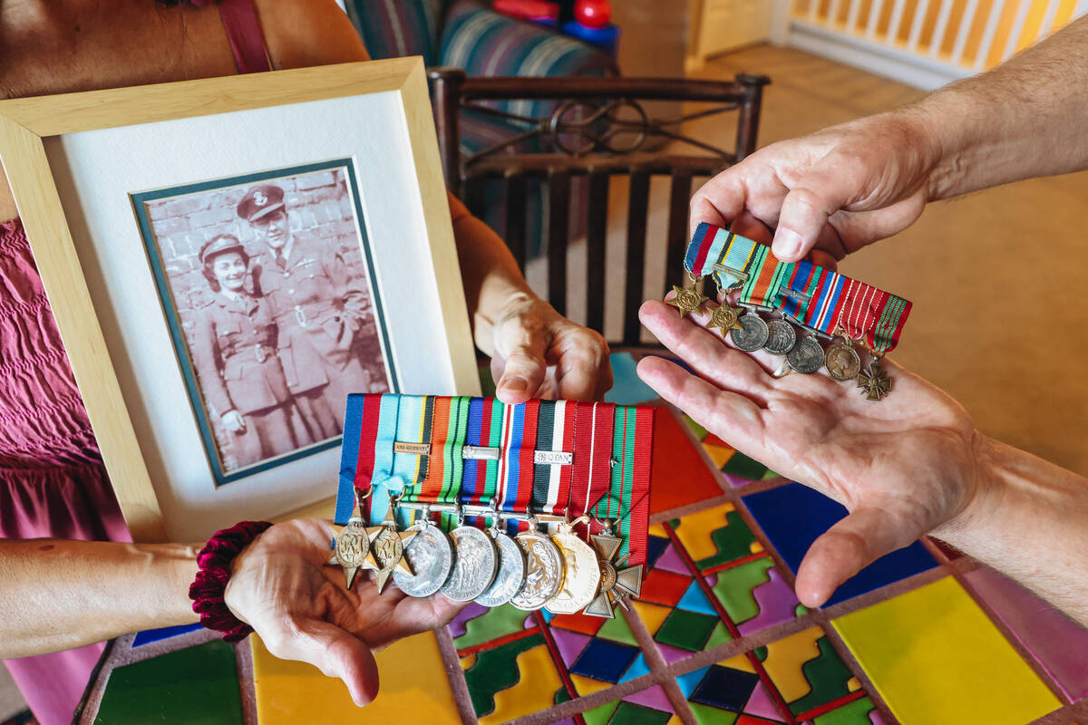 David Gibson shows off the medals his father was awarded while serving in the Royal Canadian Ai ...