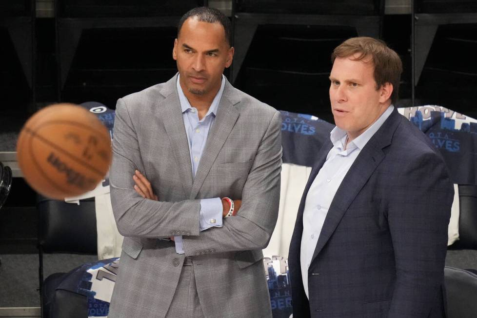 Dallas Mavericks governor Patrick Dumont (right) watches the team warm up with general manager ...