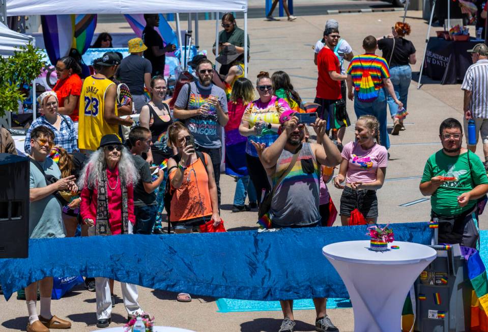 Attendees enjoy watching some live performances during the 4th Annual Henderson Pride Festival ...