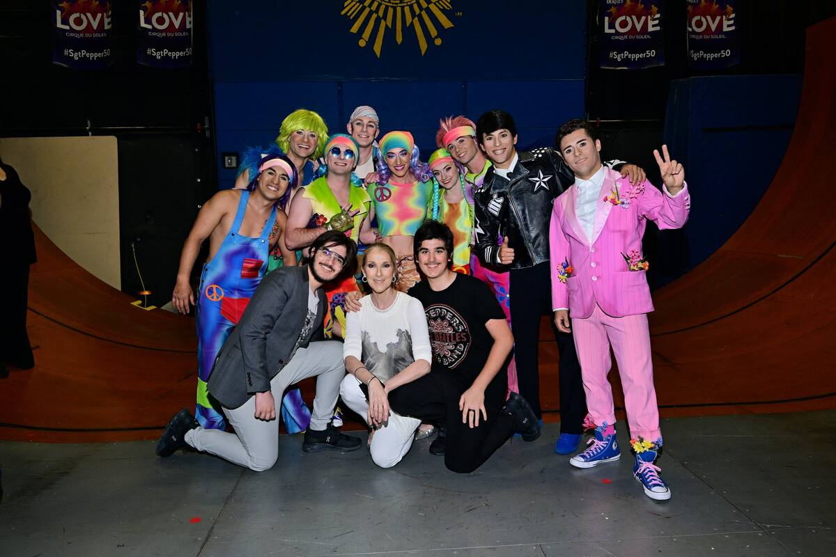 Celine Dion and her family are shown backstage with cast members of "Love" at the Mirage on Fri ...