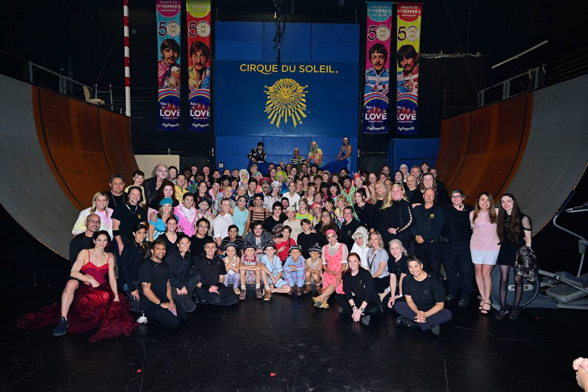 Celine Dion and her family are shown backstage with cast members of "Love" at the Mirage on Fri ...