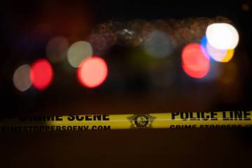 Police tape cordons off the crime scene of a homicide in the  5000 block of Sagelyn Street ...