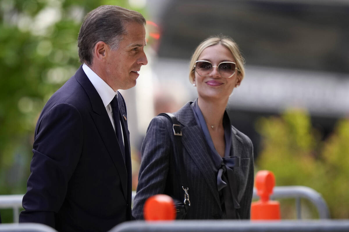 Hunter Biden, left, and his wife, Melissa Cohen Biden, arrives at federal court, Monday, June 3 ...