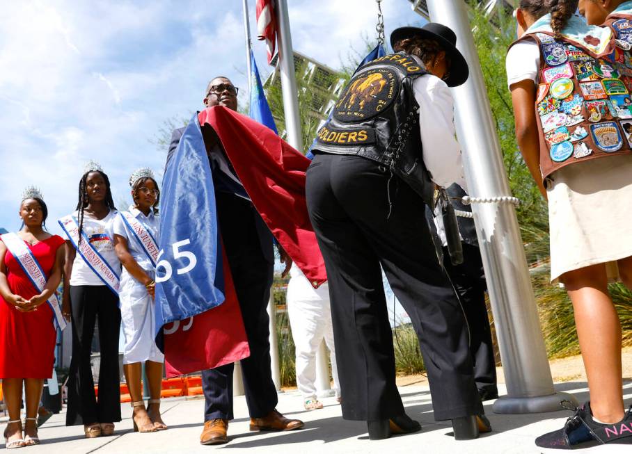 Councilman Cedric Crear, holds the Juneteenth flag as Buffalo Soldier Motorcycle Club Las Vega ...