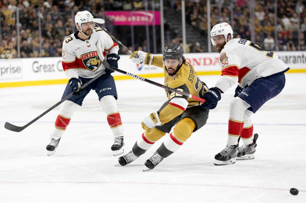 Golden Knights center Chandler Stephenson (20) skates for the puck against Florida Panthers cen ...