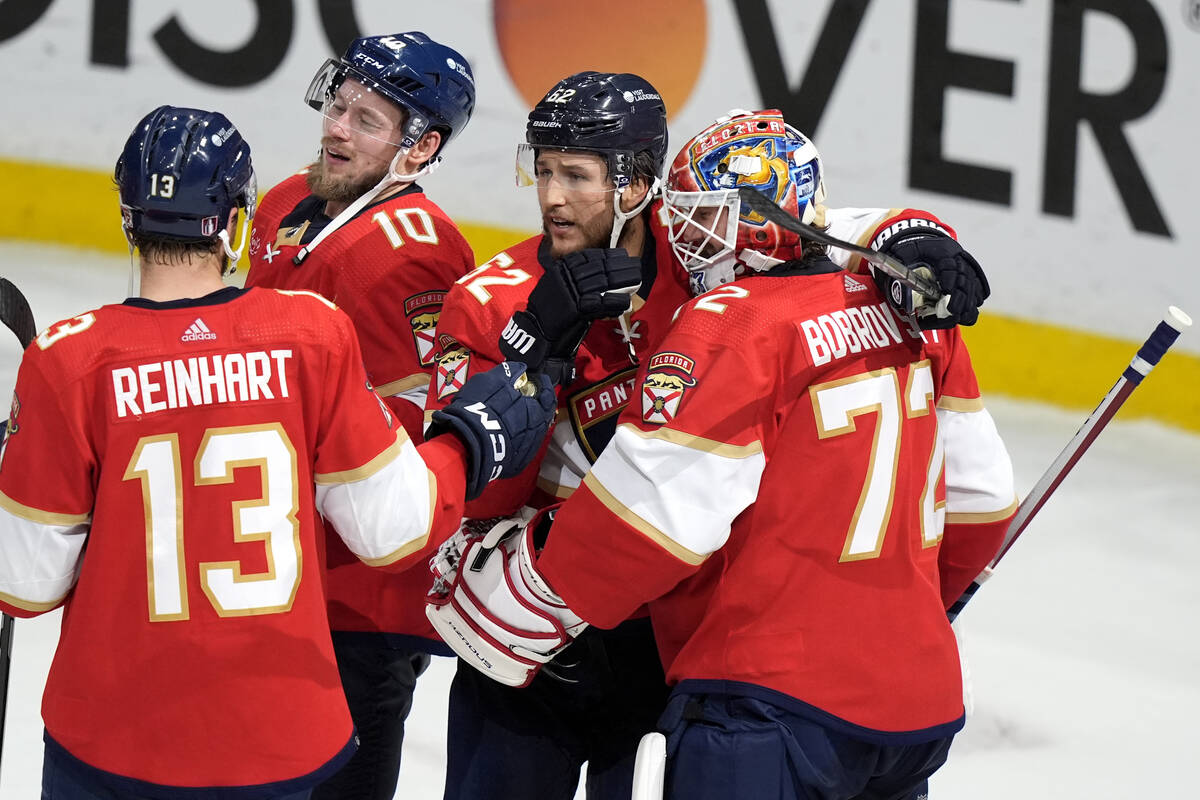 Florida Panthers center Sam Reinhart (13), right wing Vladimir Tarasenko (10), defenseman Brand ...