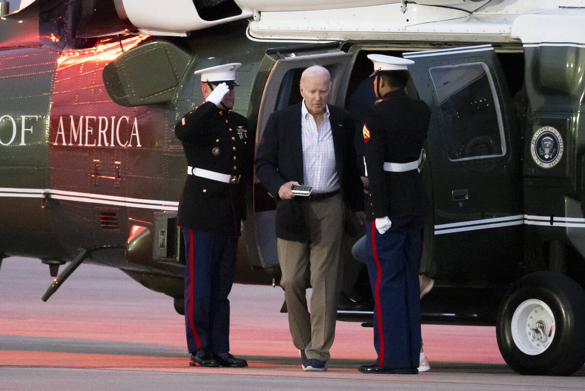 President Joe Biden arrives on Marine One at Delaware Air National Guard Base in New Castle, De ...