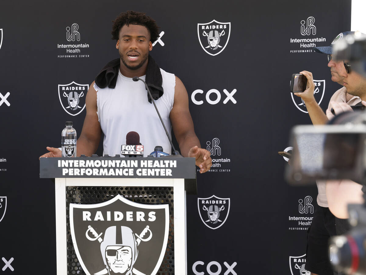 Raiders team's defensive end Malcolm Koonce addresses the media after organized team activities ...