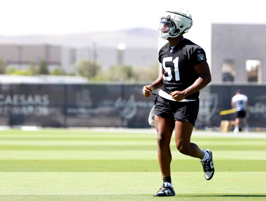 Raiders team's defensive end Malcolm Koonce takes the field to participate in organized team ac ...