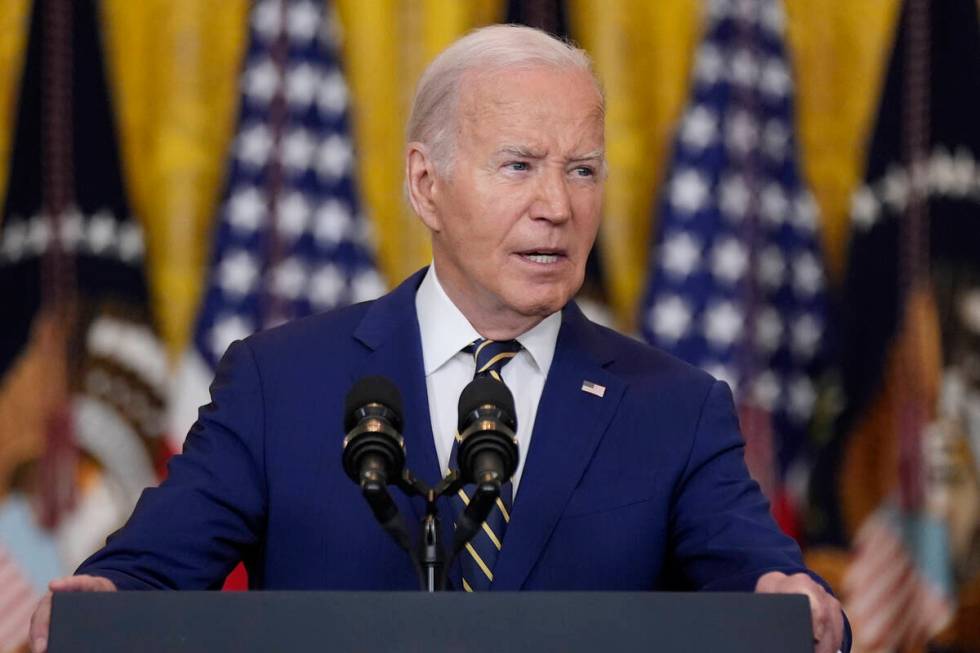 President Joe Biden speaks about an executive order in the East Room at the White House in Wash ...