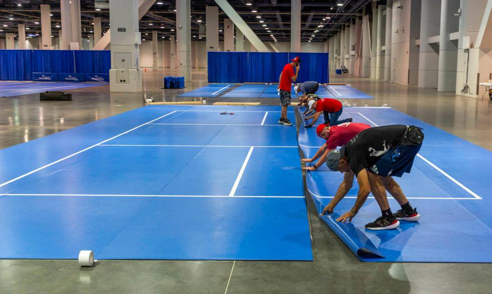 Temporary courts are being assembled for play starting tomorrow during the World Pickleball Con ...