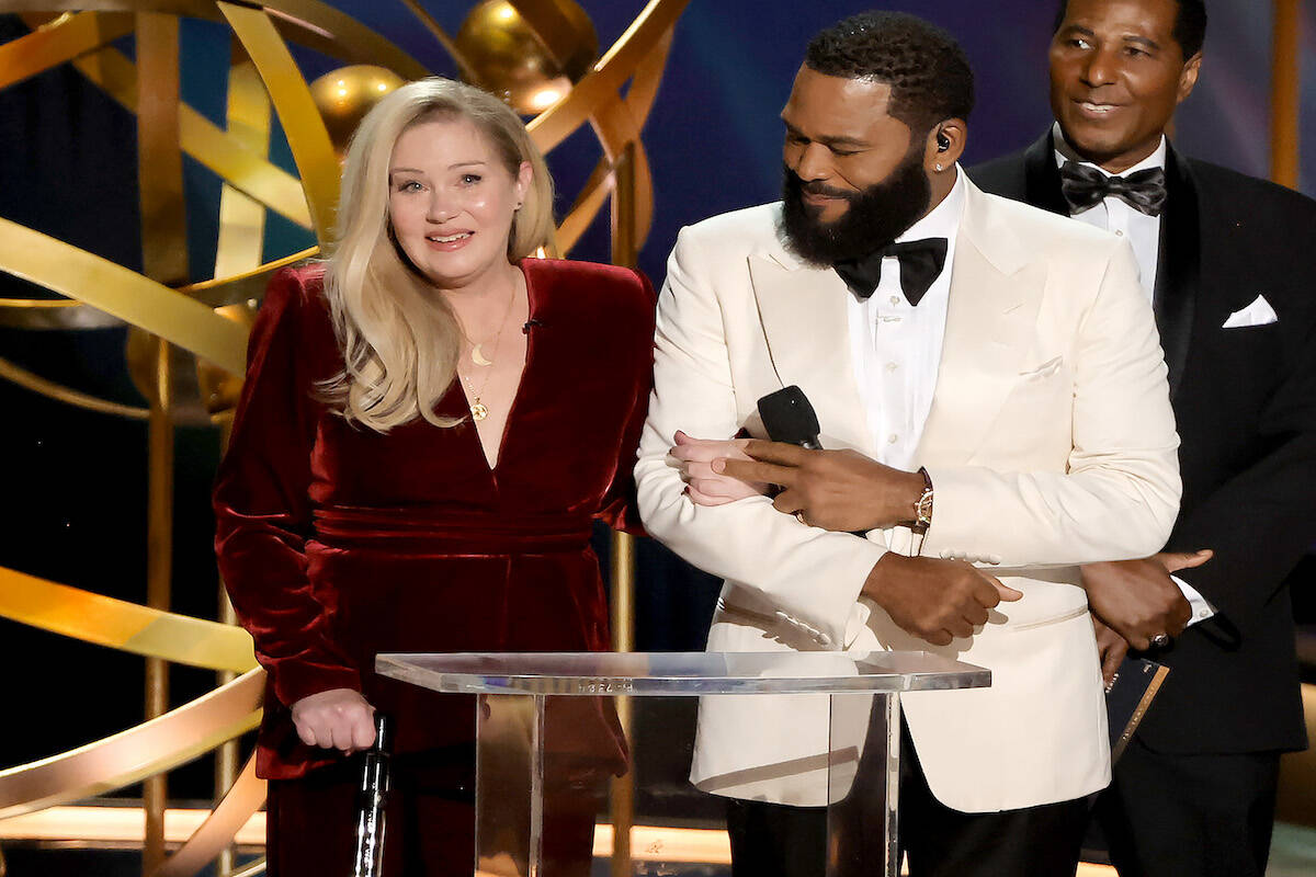 Christina Applegate, left, and host Anthony Anderson speak onstage during the 75th Primetime Em ...