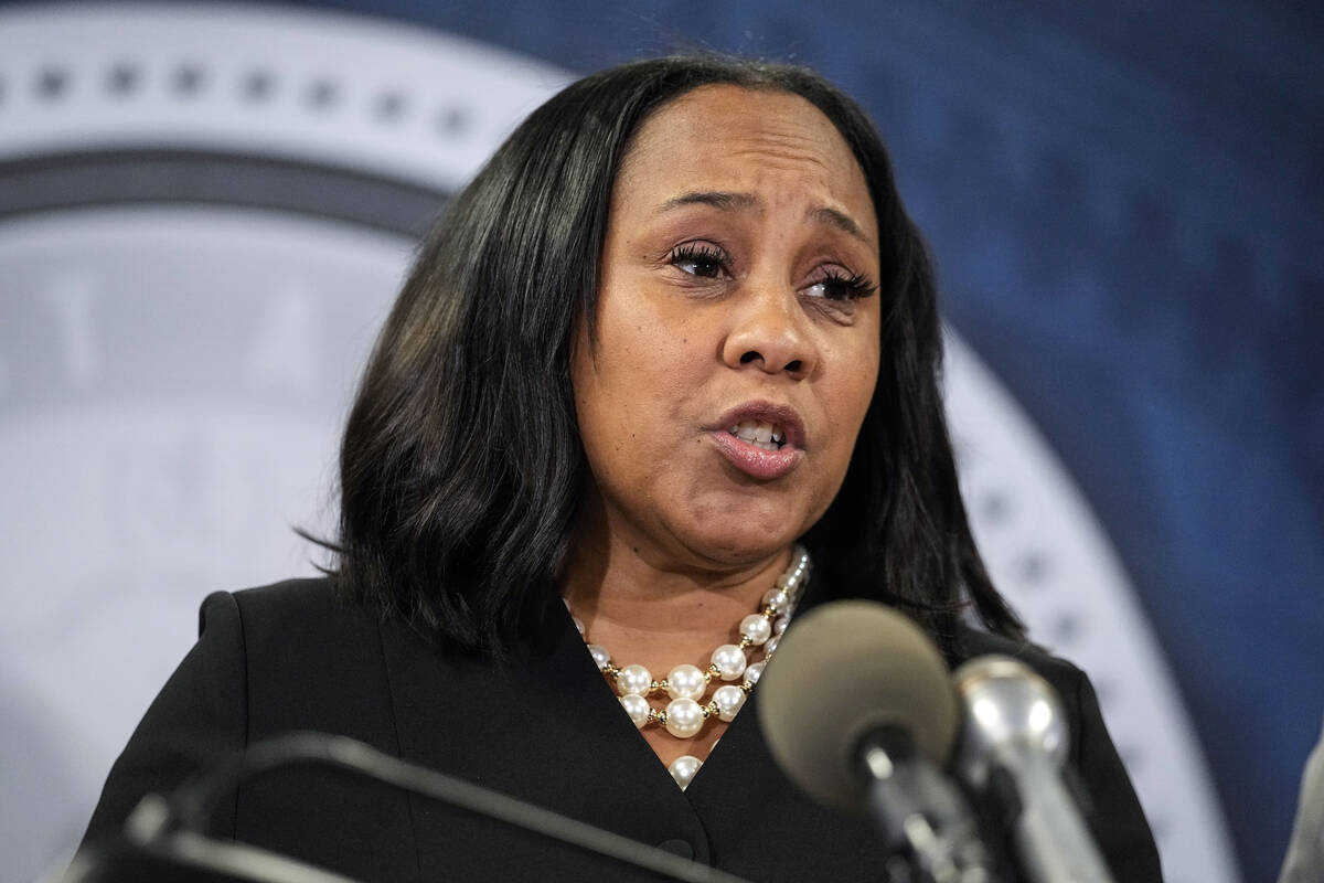 Fulton County District Attorney Fani Willis speaks during a news conference, Aug. 14, 2023, in ...