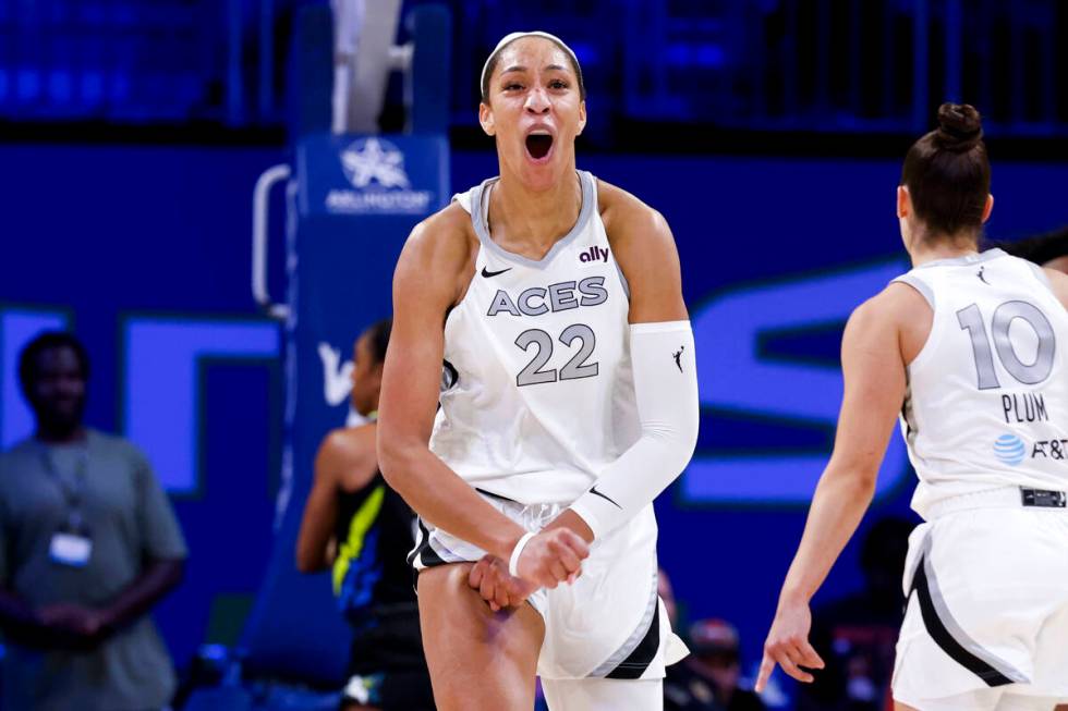Las Vegas Aces center A'ja Wilson reacts after scoring from a three-pointer against the Dallas ...
