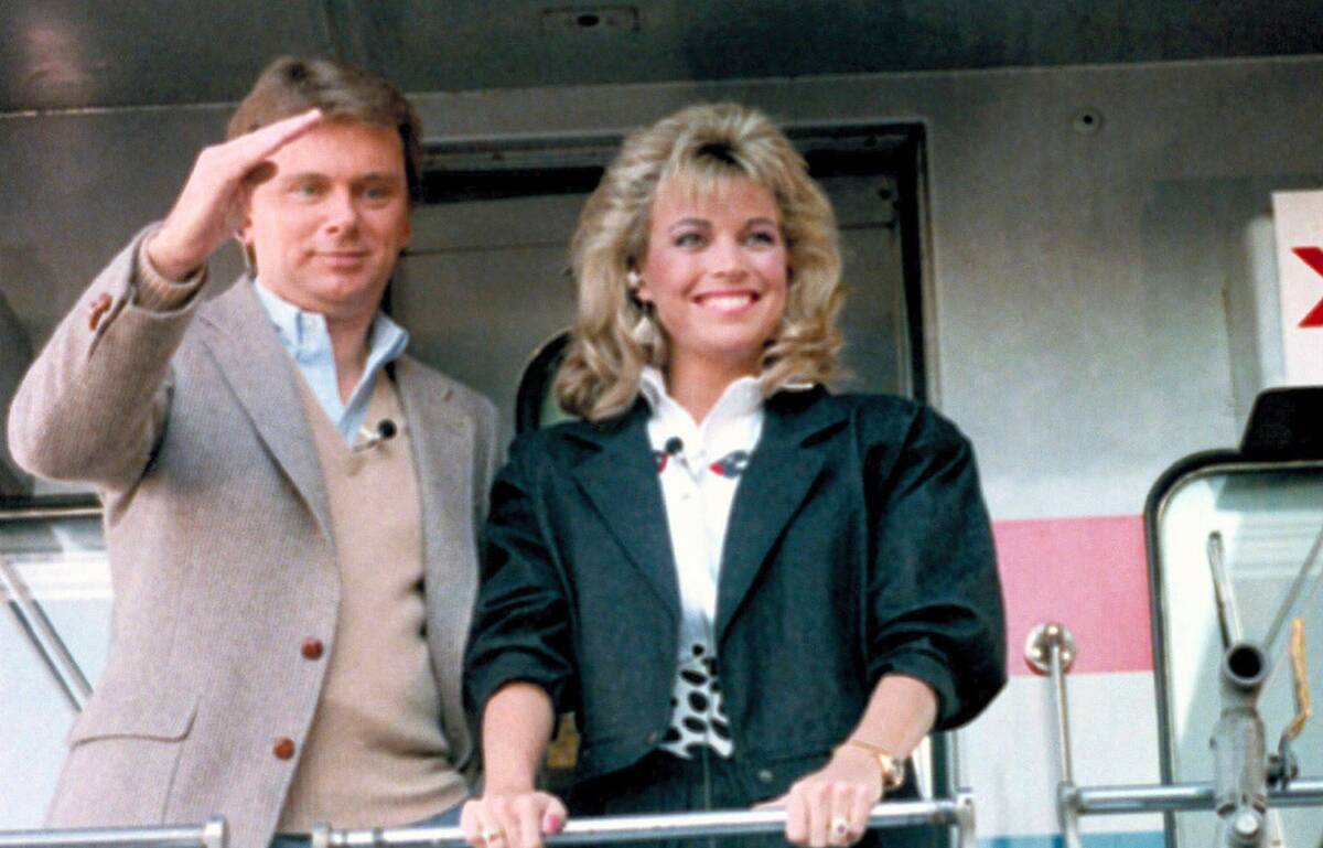 Pat Sajak, left, and Vanna White appear aboard the Wheel of Fortune Express in Miami on Feb. 12 ...
